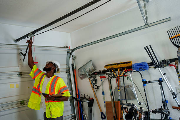 Professional Garage Door Roller Replacement technician working in Lawrence, MA